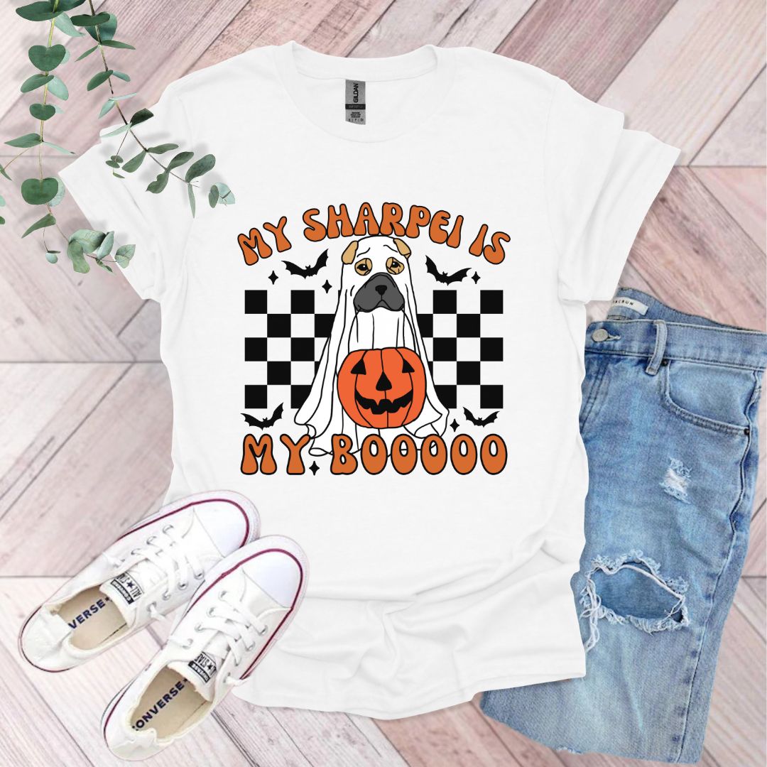 a white t - shirt with a pumpkin on it