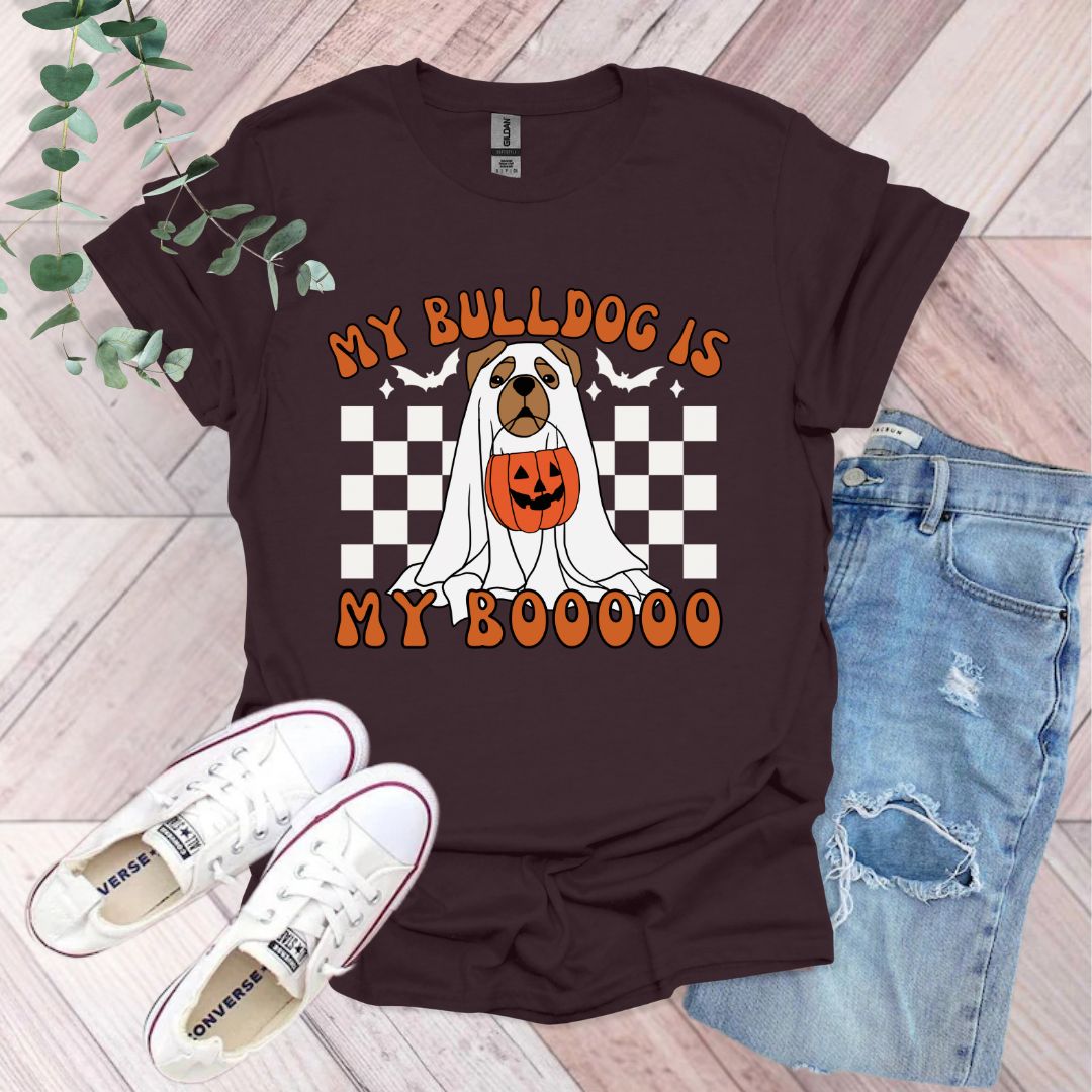 a t - shirt with a dog wearing a pumpkin on it