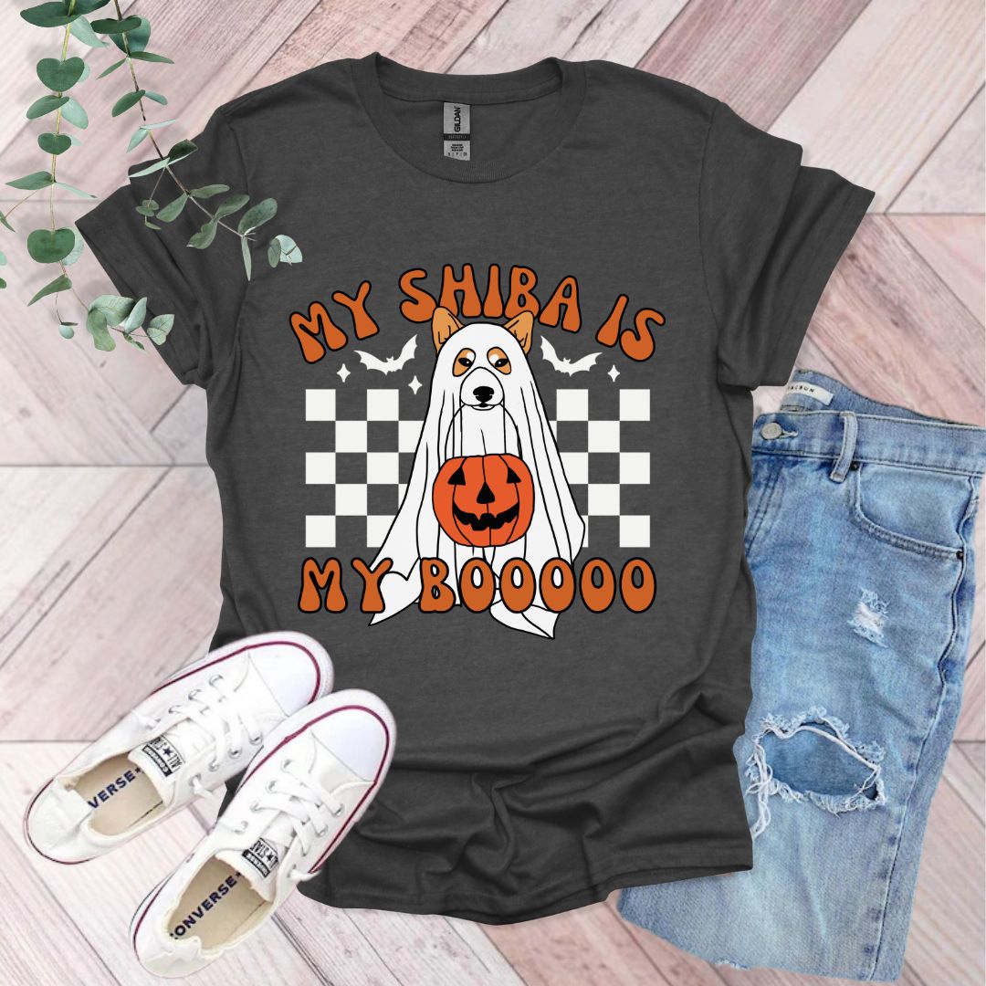 a black shirt with a ghost and pumpkin on it