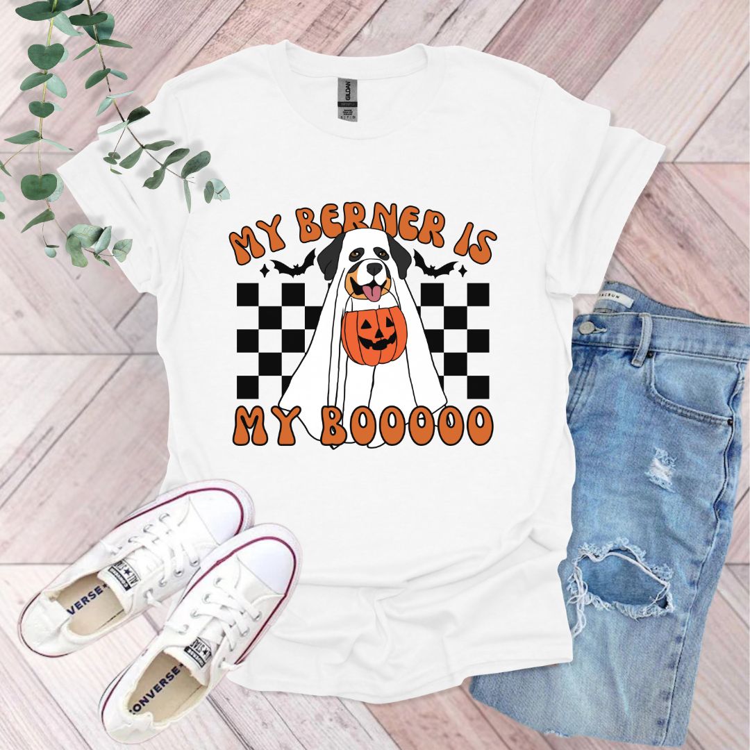 a white t - shirt with a black and white dog wearing a jack - o