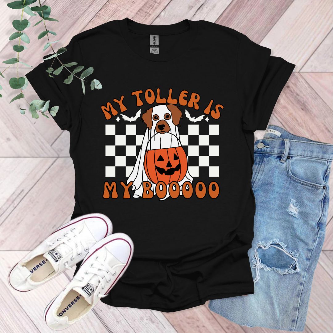 a t - shirt with a dog wearing a pumpkin on it