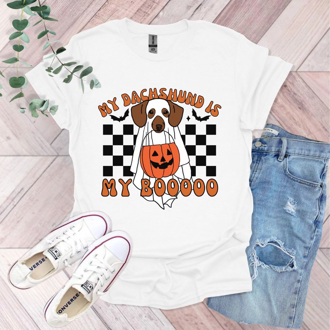 a t - shirt with a dog wearing a jack - o'- lantern on