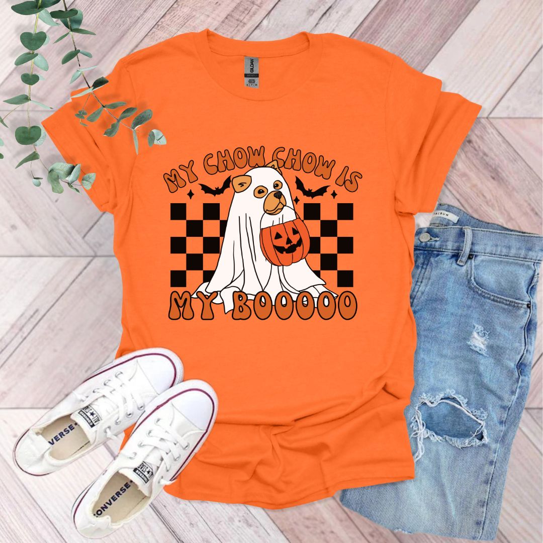 an orange shirt with a ghost and pumpkin on it