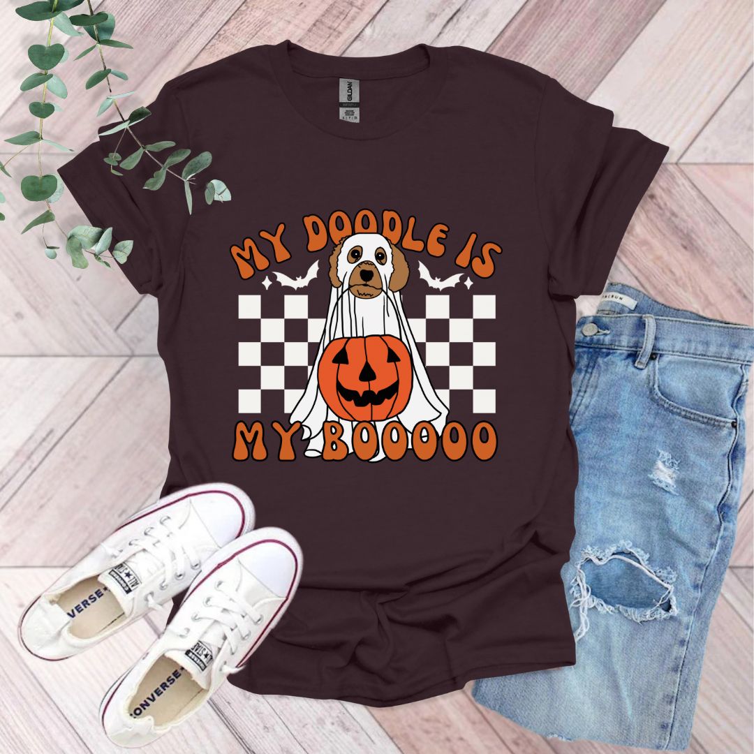 a t - shirt with a dog in a pumpkin costume