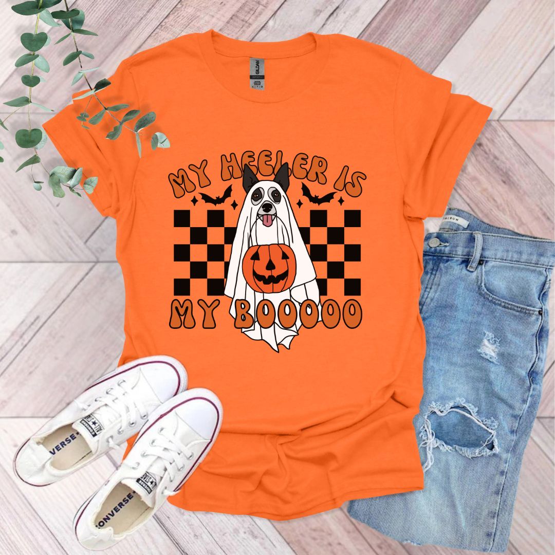 an orange shirt with a dog wearing a ghost costume