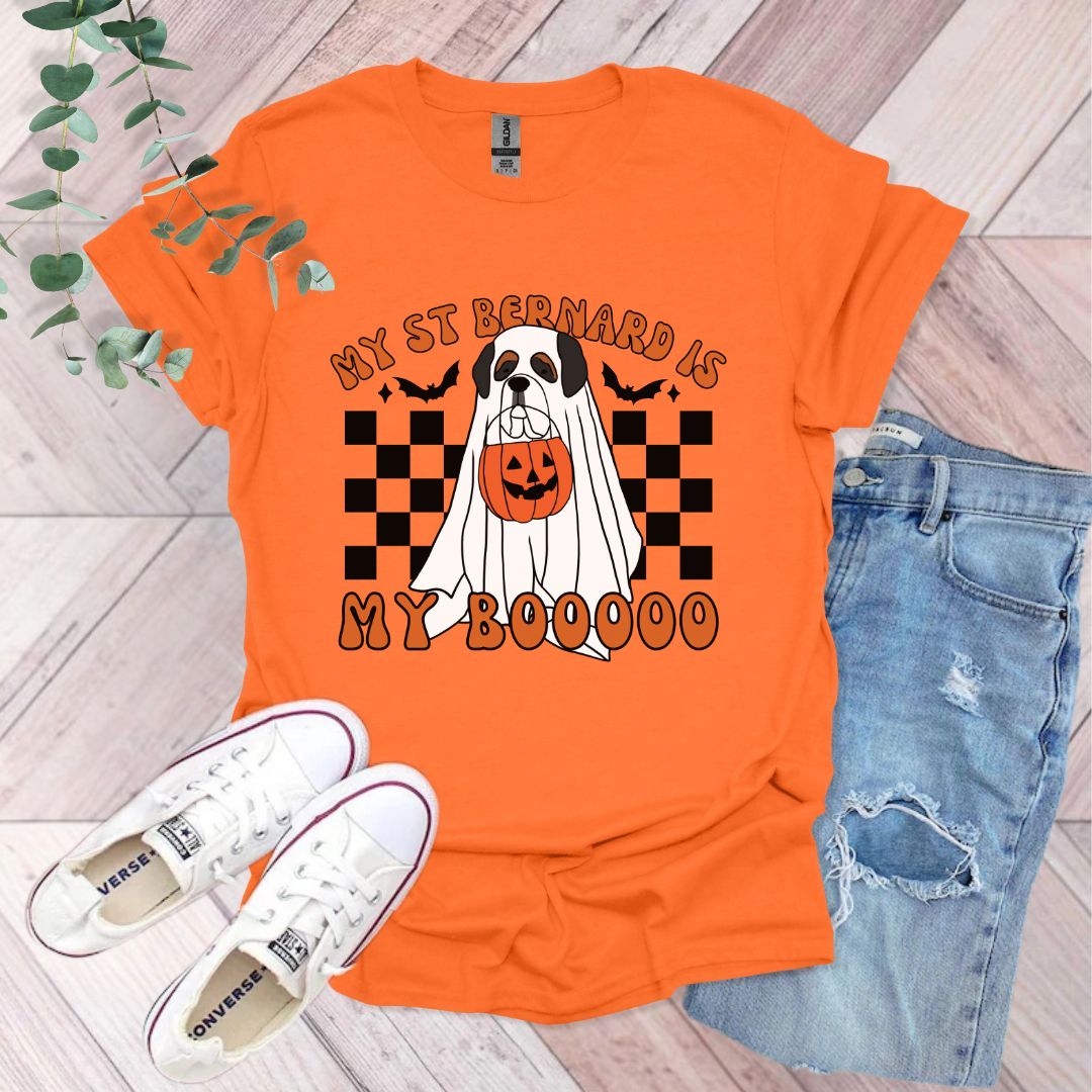 an orange shirt with a black and white dog wearing a ghost costume