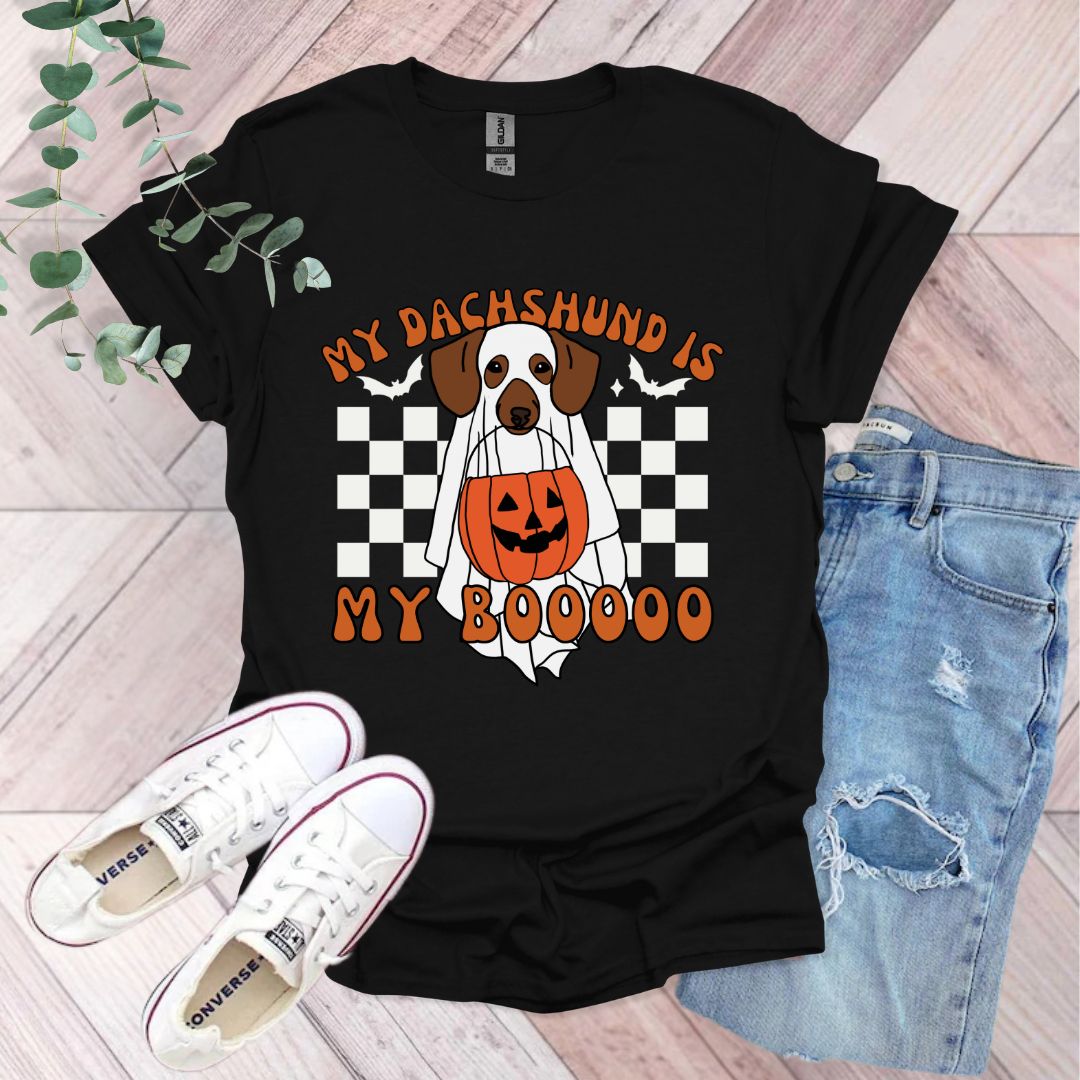 a black shirt with a brown and white dog on it