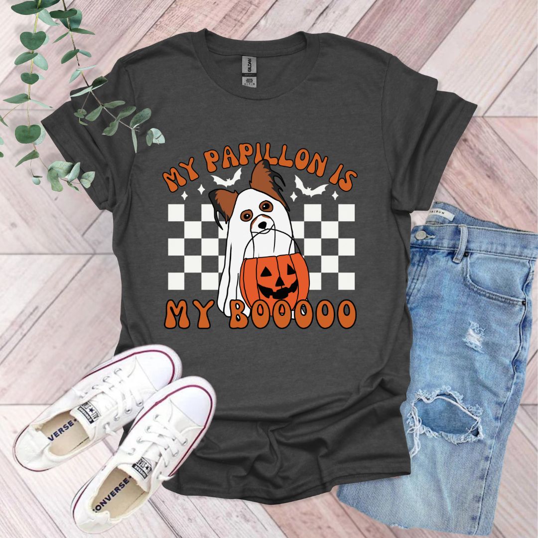 a black shirt with a dog wearing a pumpkin on it