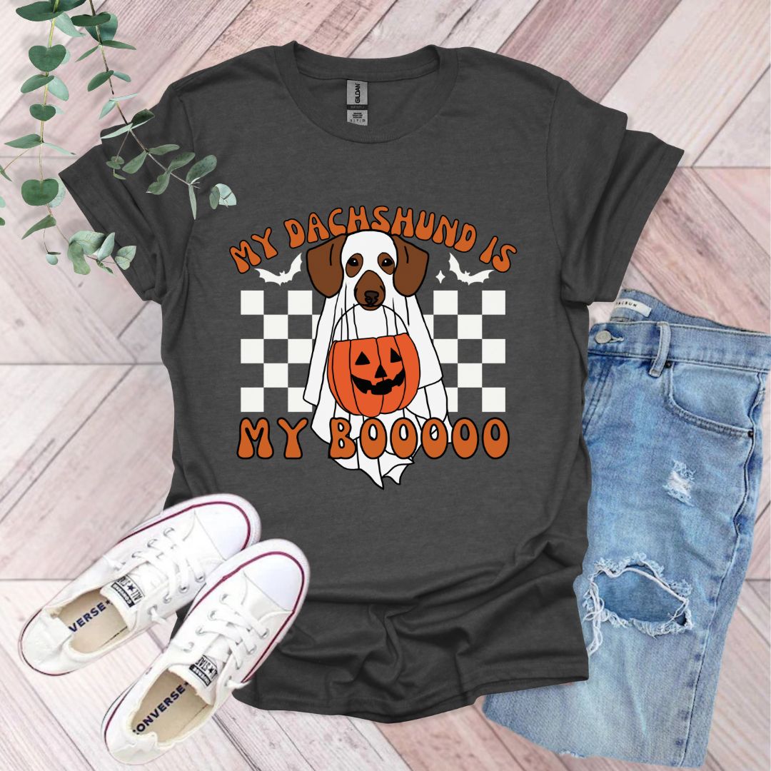 a black shirt with a brown and white dog on it
