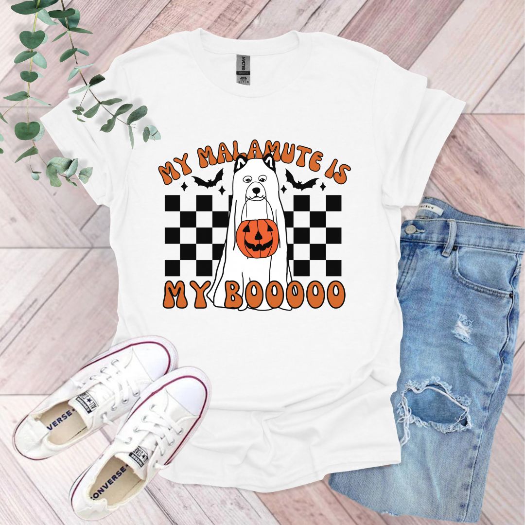 a white t - shirt with a dog wearing a jack o lantern pumpkin on it