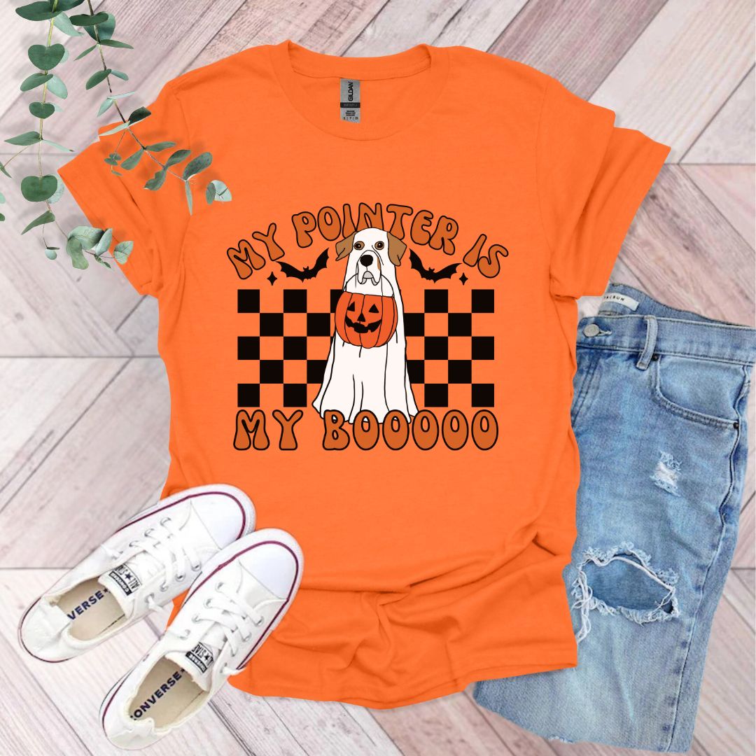 an orange shirt with a white dog wearing a jack - o'- lantern pumpkin