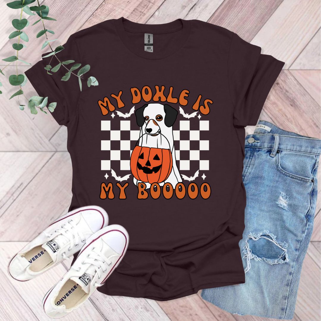 a t - shirt that says, my doll is my booooo