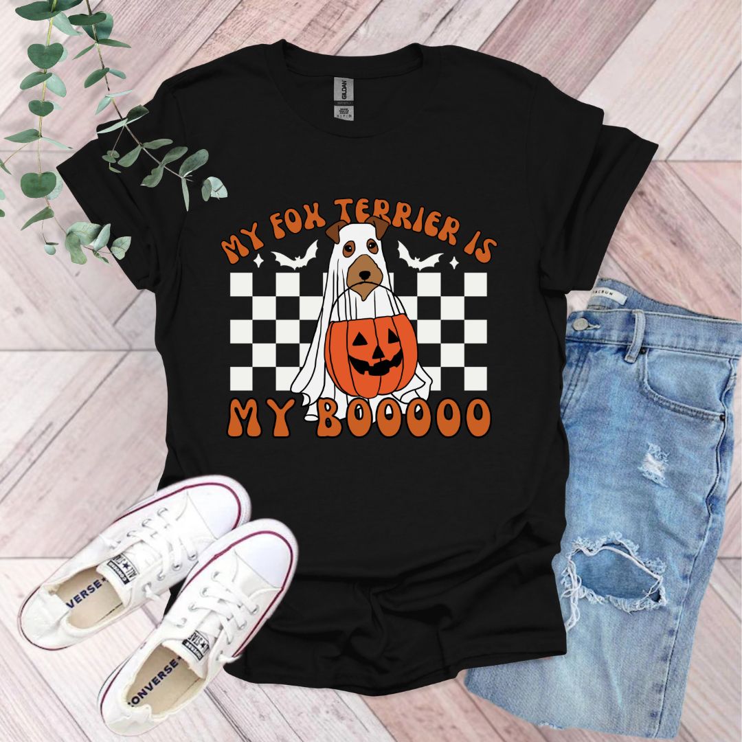 a black shirt with a dog wearing a pumpkin costume