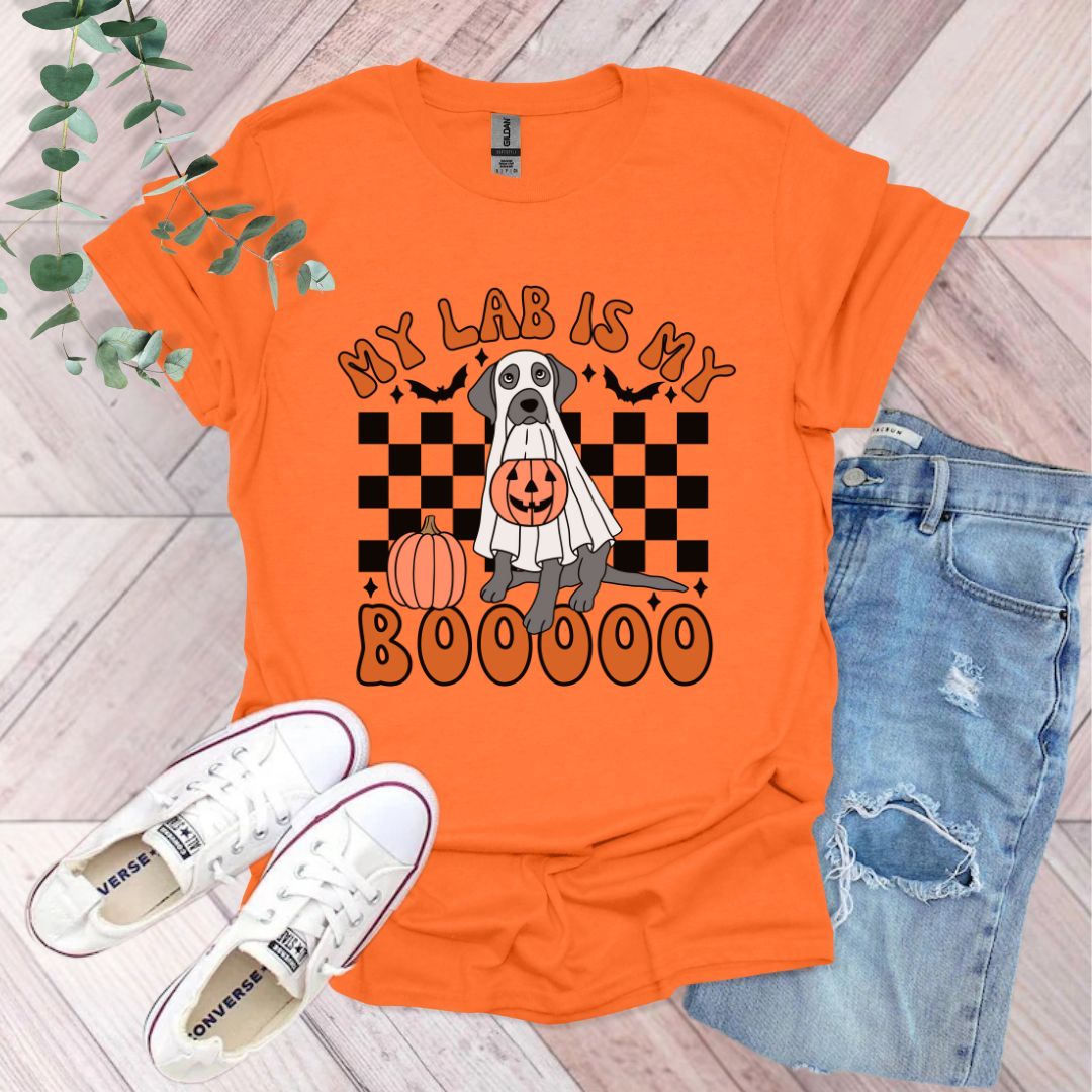 an orange shirt with a dog wearing a pumpkin costume
