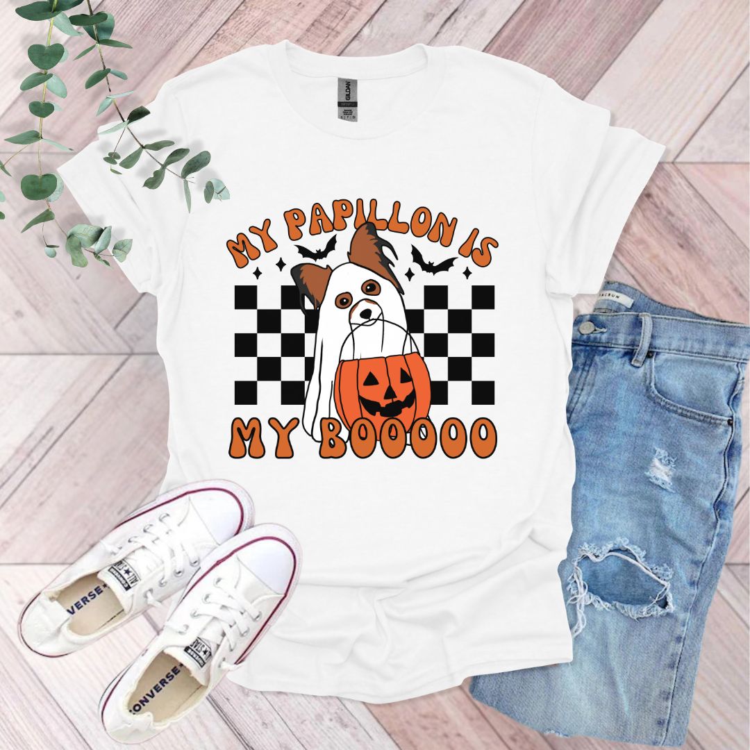 a t - shirt with a dog wearing a pumpkin on it