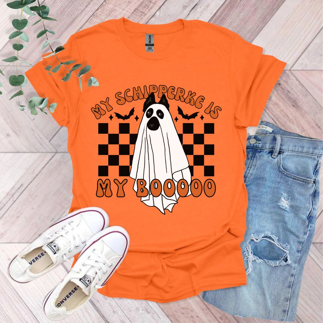 an orange shirt with a ghost on it