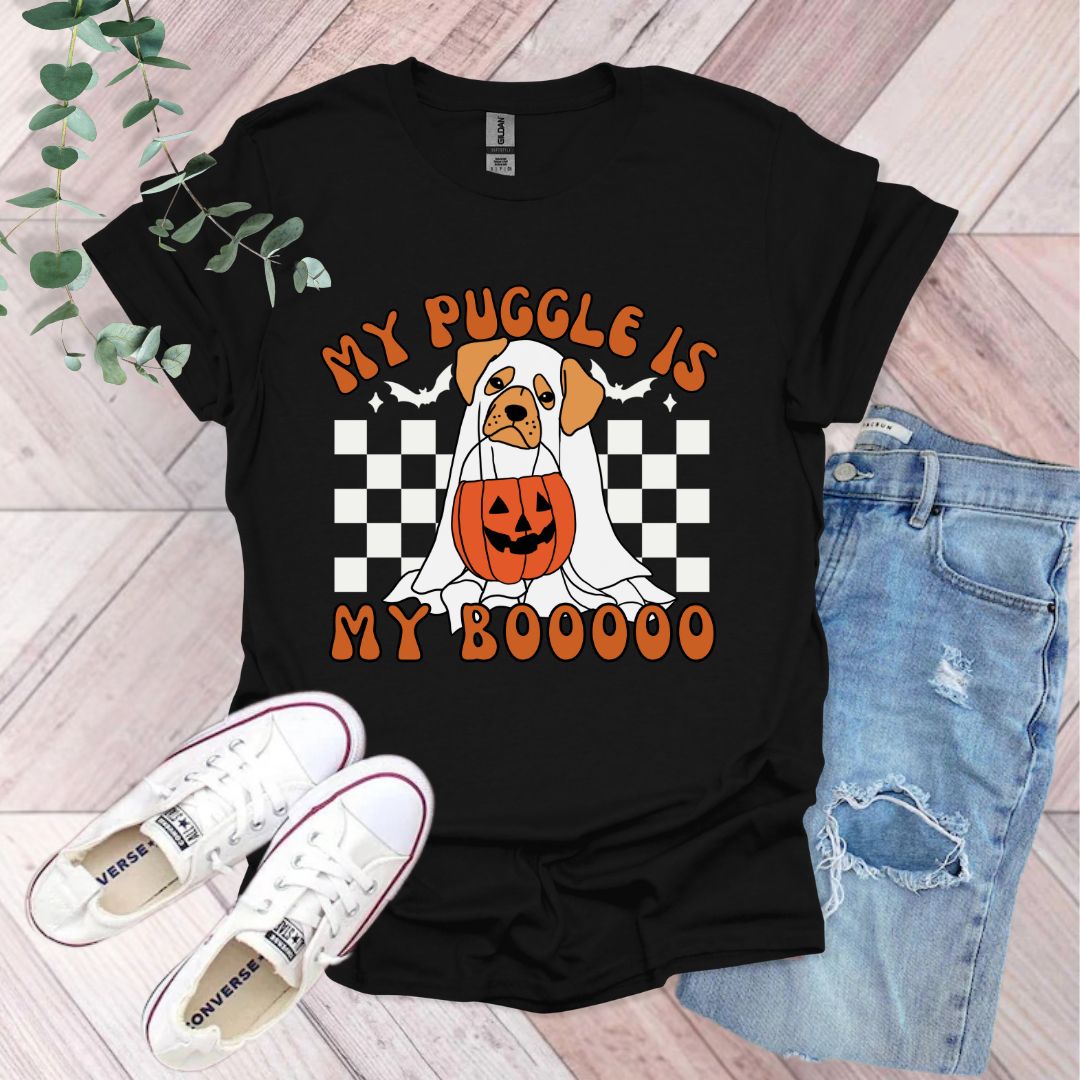 a black shirt with a dog wearing a pumpkin on it