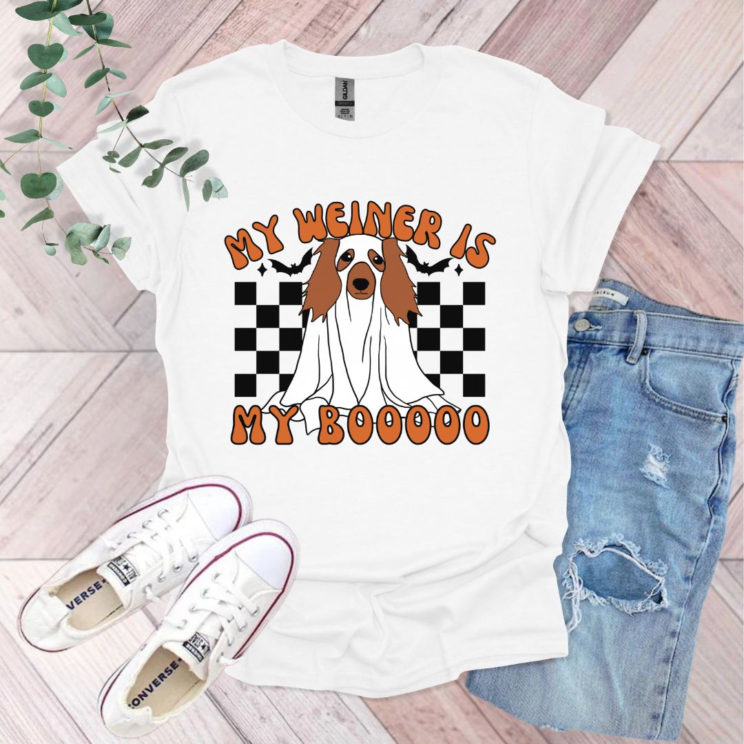 a white shirt with a brown dog on it