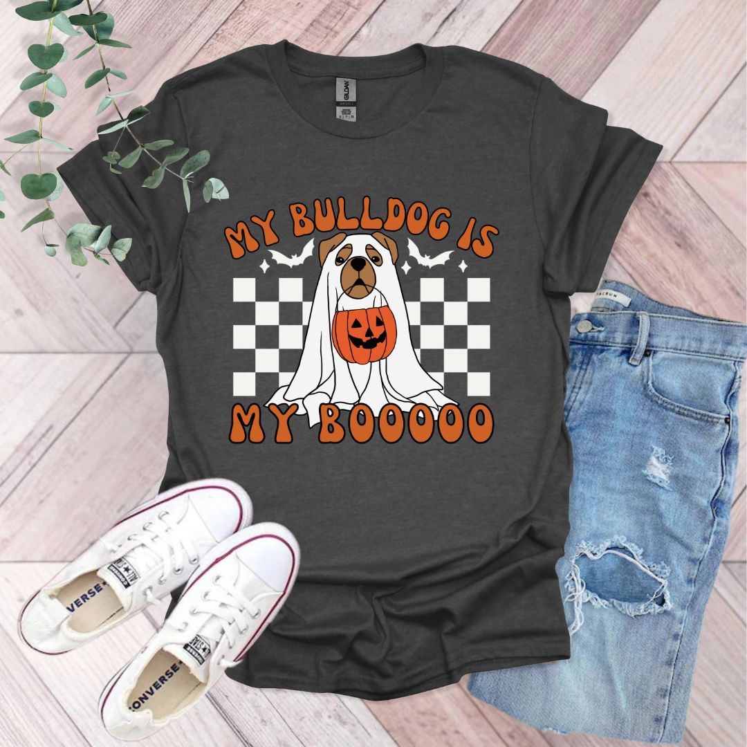 a black shirt with a dog wearing a pumpkin on it