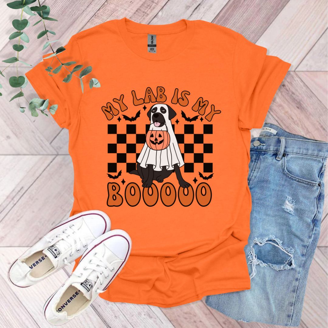 an orange shirt with a black and white dog on it