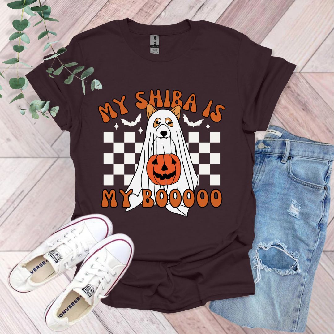 a t - shirt with a ghost and pumpkin on it