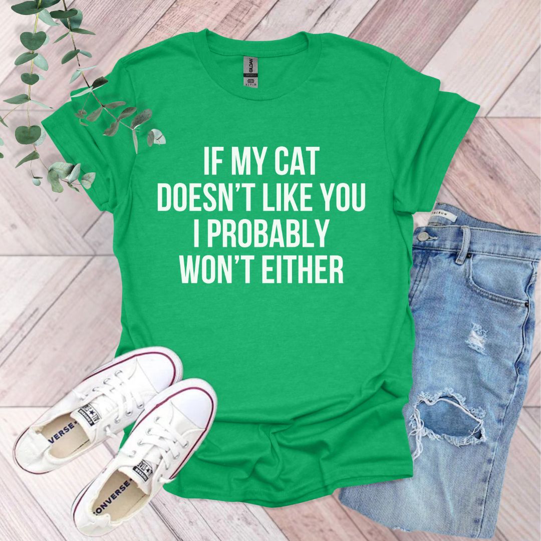 a green shirt that says if my cat doesn't like you i probably won