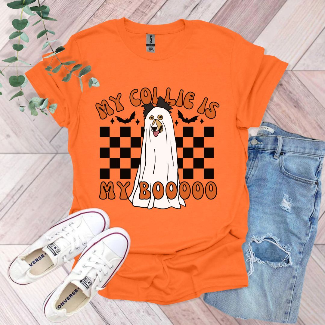 an orange shirt with a ghost on it