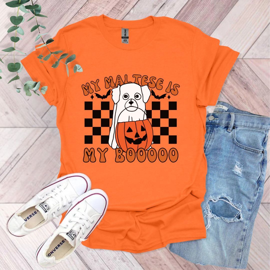 an orange tshirt with a dog on it