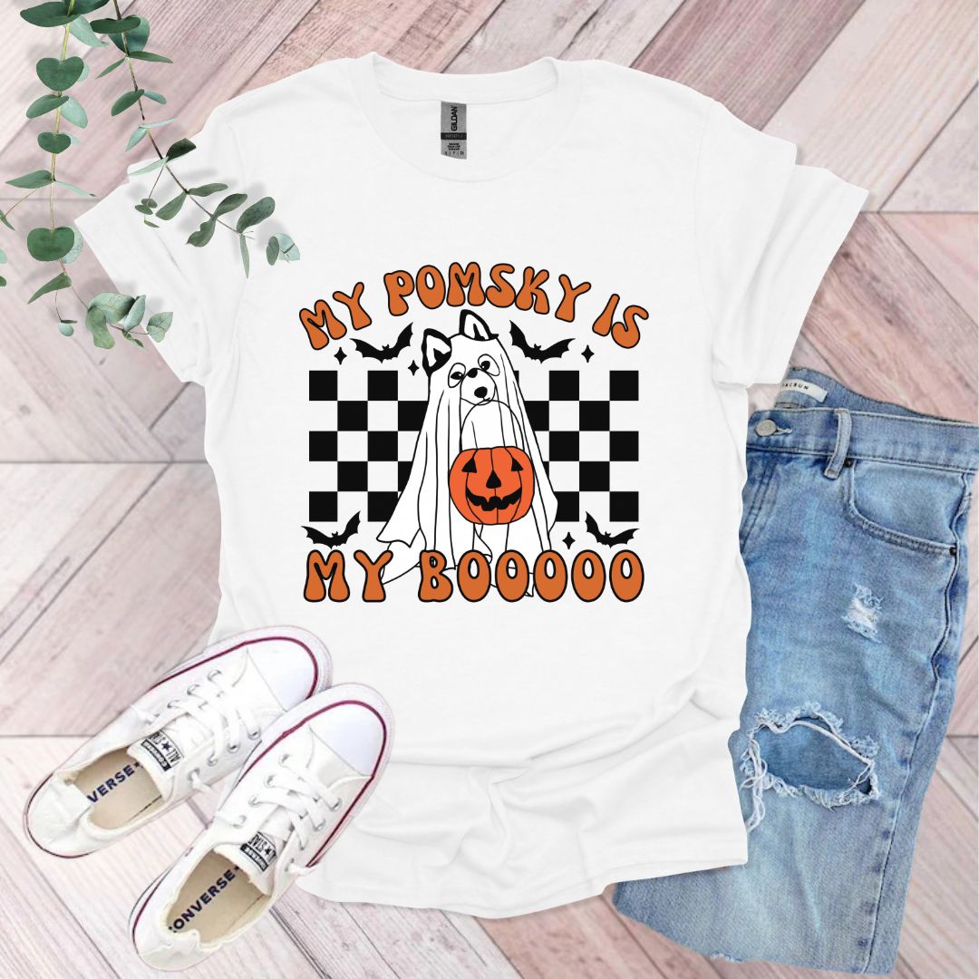 a white t - shirt with a jack - o - lantern on it