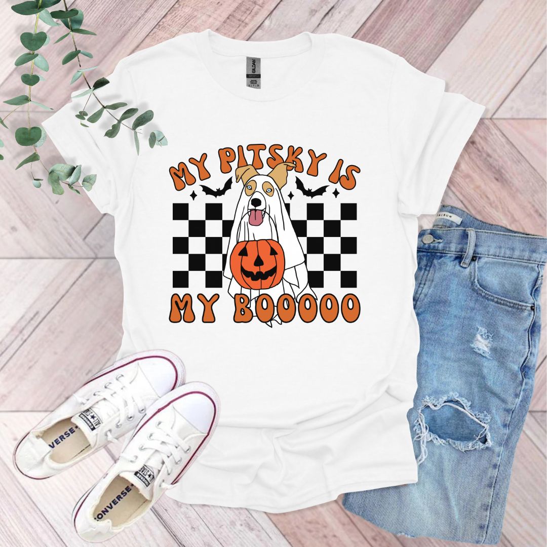 a white shirt with a pumpkin on it