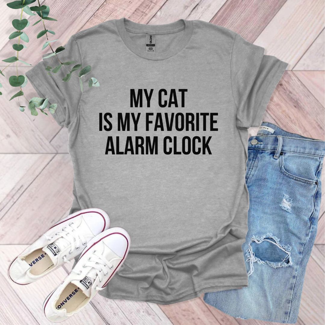 a t - shirt that says, my cat is my favorite alarm clock