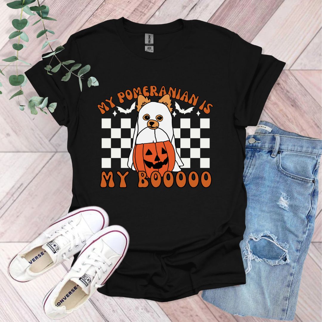 a black shirt with a picture of a dog on it