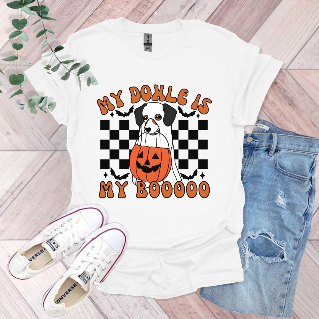 a t - shirt with a dog wearing a jack - o'- lantern pumpkin