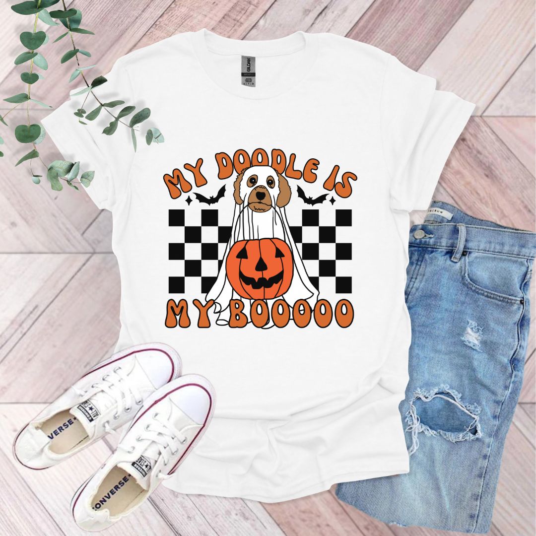 a t - shirt with a dog wearing a pumpkin on it
