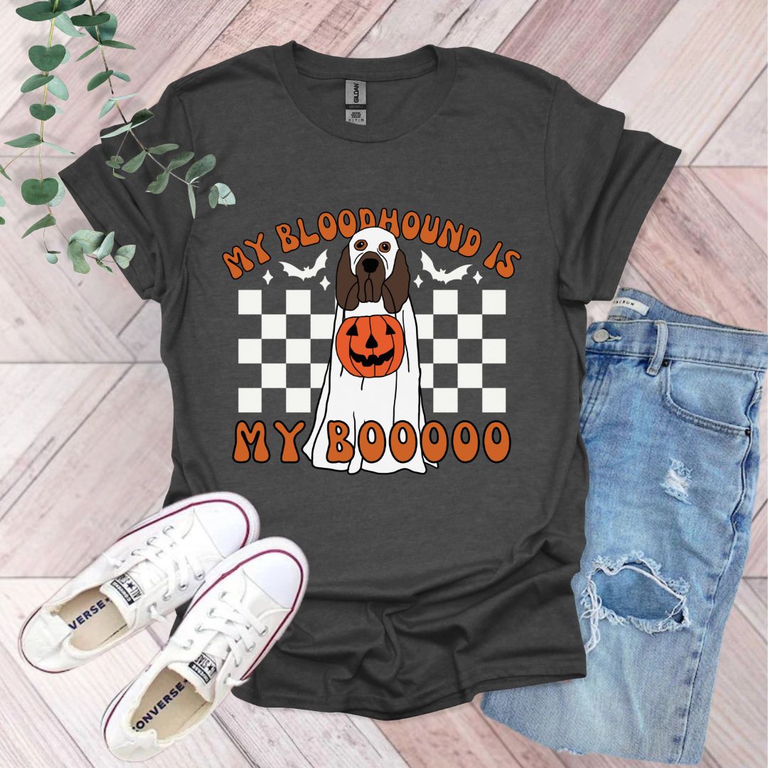 a t - shirt with a dog wearing a pumpkin on it