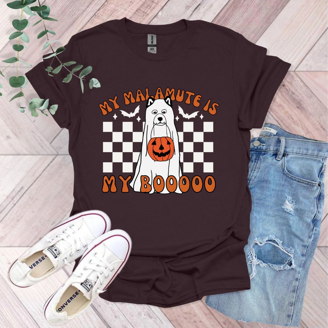 a t - shirt with an image of a dog wearing a jack o lantern pumpkin