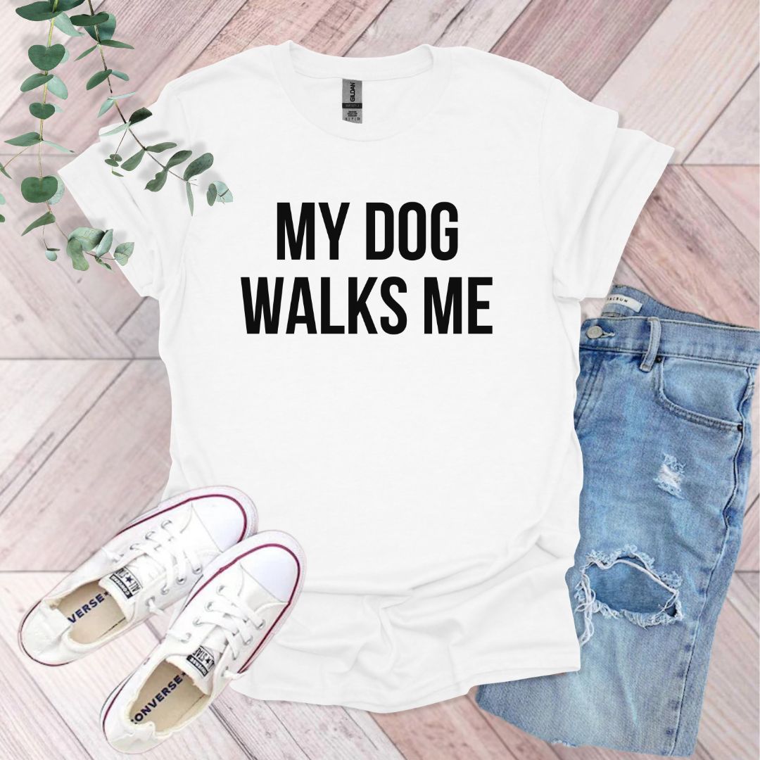 a t - shirt that says, my dog walks me