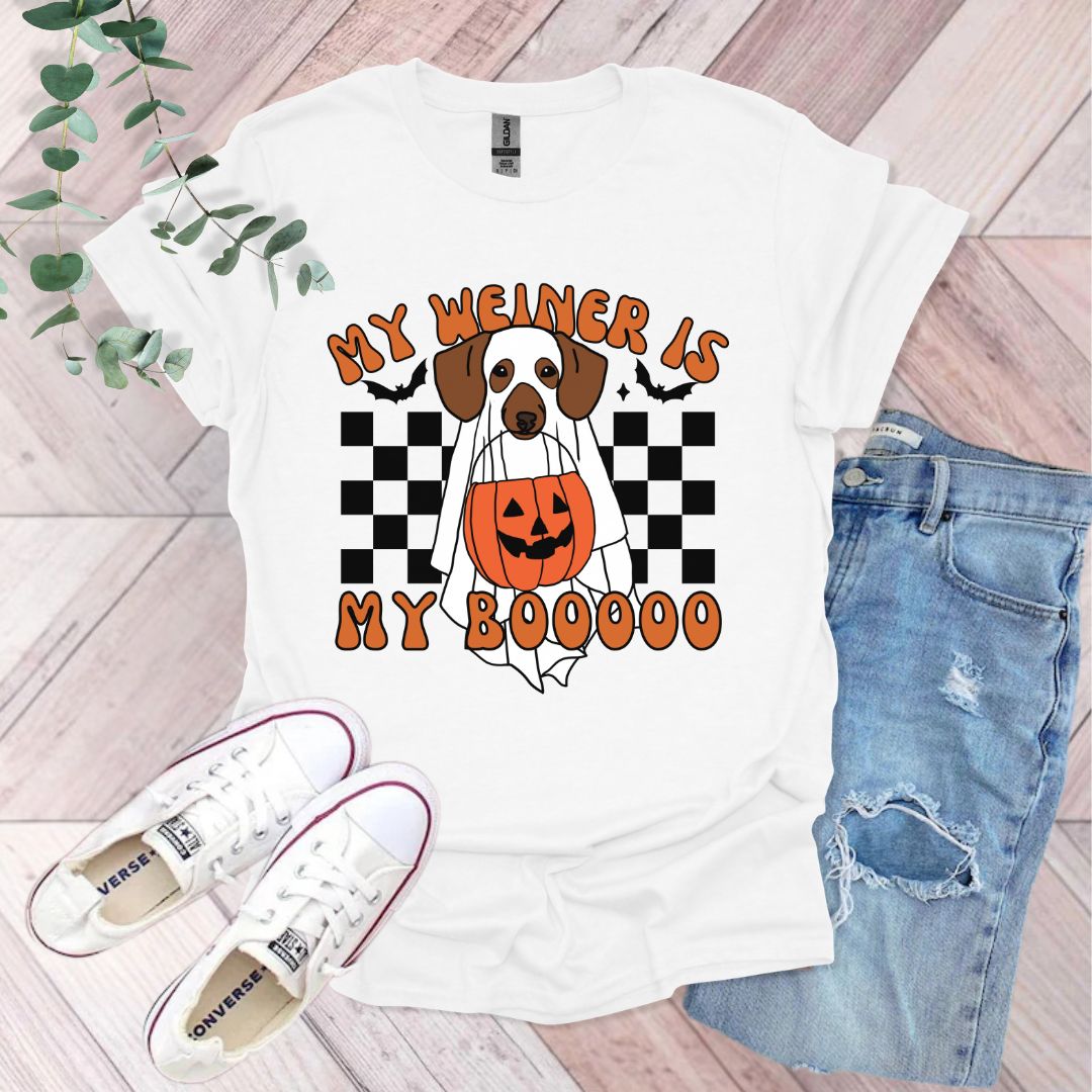 a t - shirt with a dog wearing a pumpkin on it