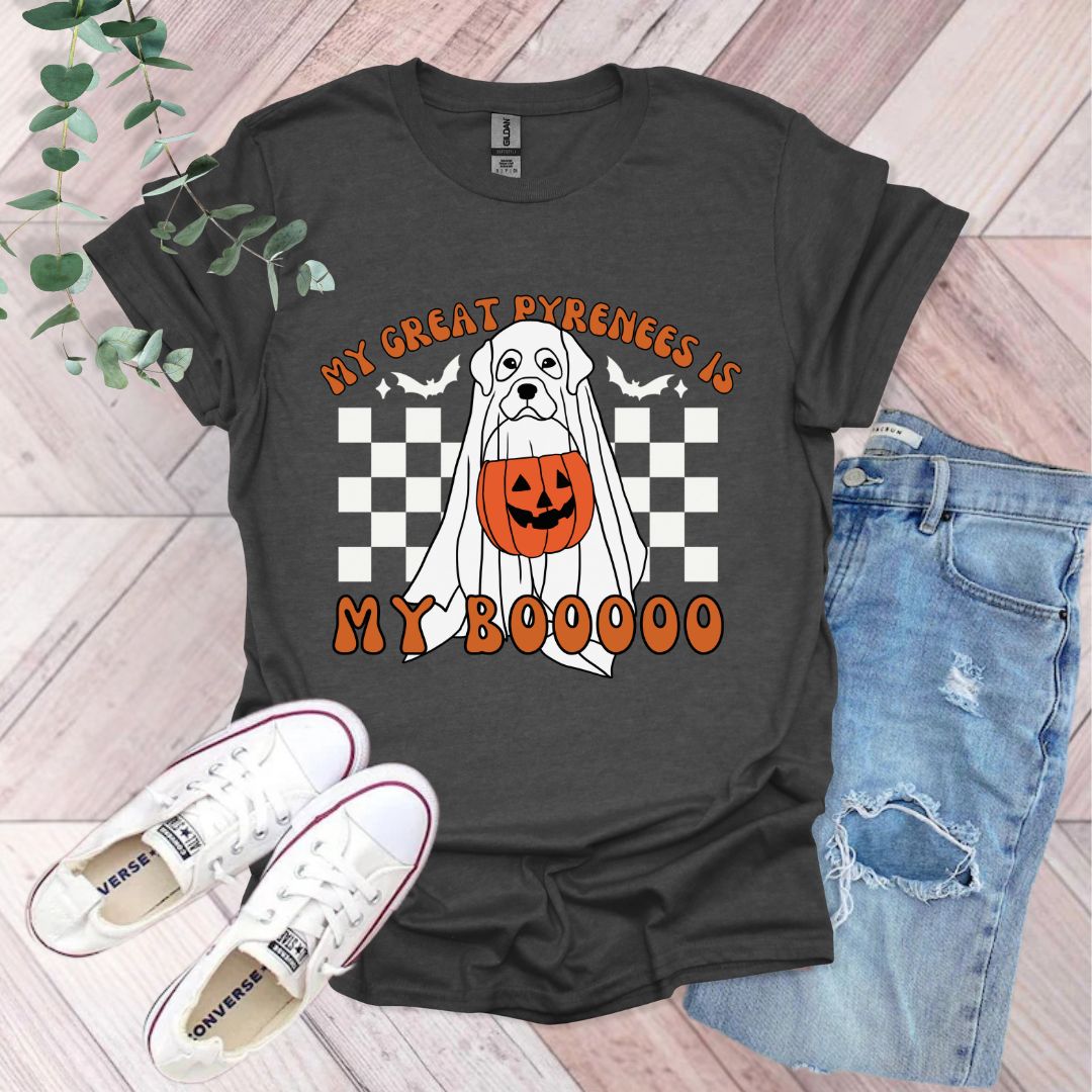 a black shirt with an orange pumpkin on it