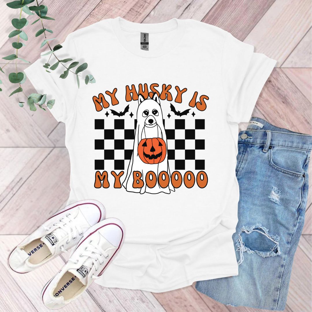 a white t - shirt with a pumpkin on it