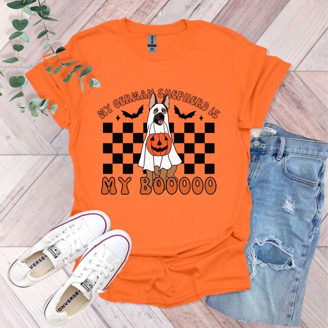 an orange shirt with a dog wearing a ghost costume