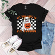 a black shirt with a dog wearing a pumpkin on it