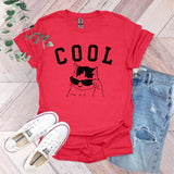 a red shirt that says cool with a cat wearing sunglasses