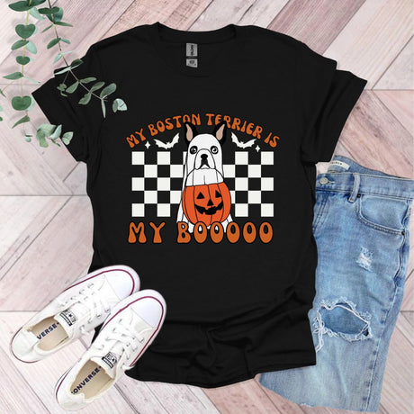 a t - shirt with a pumpkin on it that says my boston terrier is