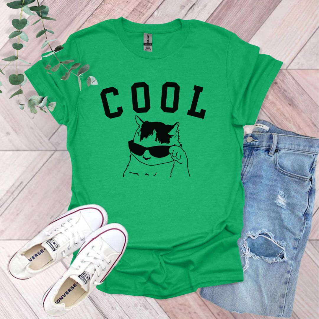 a green t - shirt with the words cool on it