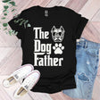 a t - shirt that says the dog father with a dog's paw on