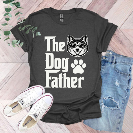 a t - shirt that says the dog father with a dog paw on it