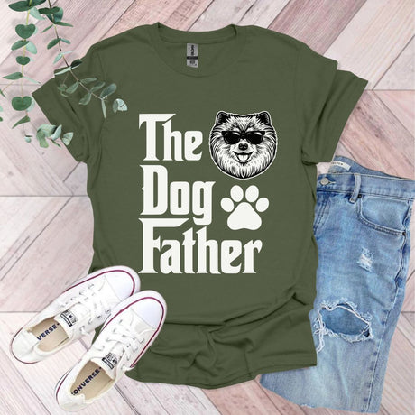 a t - shirt that says the dog father with a dog's paw on