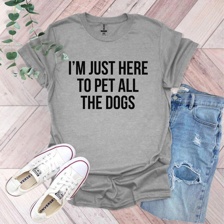 a t - shirt that says i'm just here to pet all the dogs