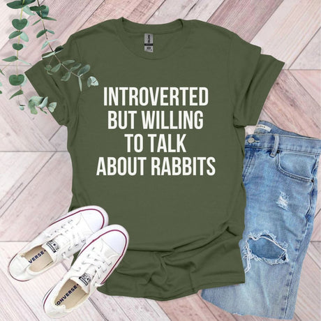 a t - shirt that says,'it's hard to talk about rabbits